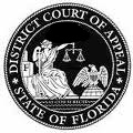 Black circle with a blank and white dotted outer line and an inner black ring with white dotted inner line and white letters in between all capped on the top arch “DISTRICT COURT OF APPEAL” and white letters all capped on the bottom arch with a white star then “STATE OF FLORIDA” and another white star, and in the middle of the circle in white on a black background at the top in white letters all capped “FIFTH DISTRICT” and below that on the right is a bald eagle with chest shield with 13 black and white stripes perched on a white half globe facing a seated Goddess of Justice in a white toga holding her scales seated on the bottom of 3 stone steps on the left side, and the middle step has a black “F” in the middle