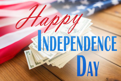 Sass Law Firm Blog Picture of Happy Independence Day with a stack of cash and american flag in the background