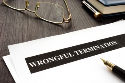Sass Law Firm Blog papers with the words wrongful termination